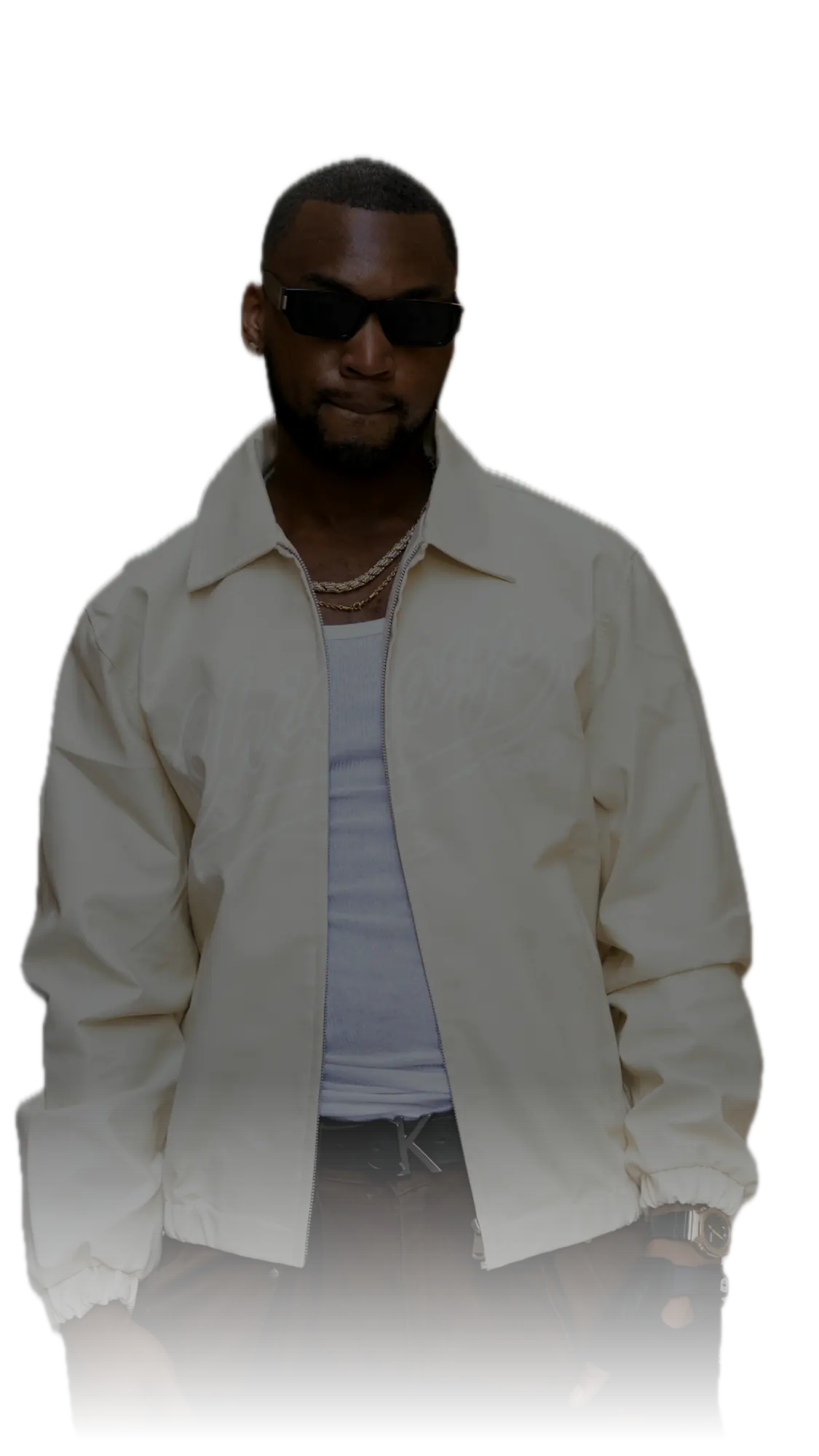 Bren Got Hits in sunglasses and a cream Chicago jacket